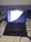 A picture of Dell Latitude E6400 with broken screen bt works well