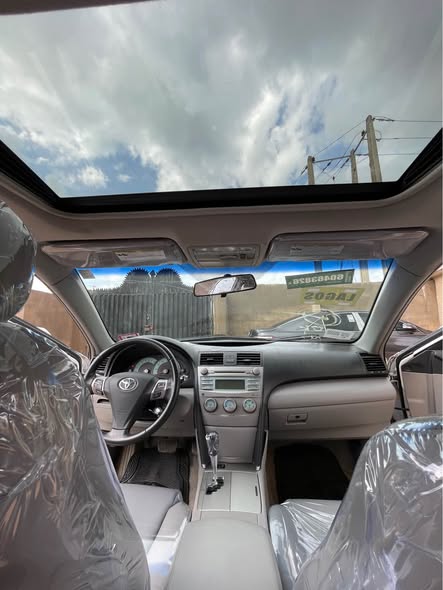 A picture of DIRECT TOKUNBO EXQUISITE CLEAN CAMRY SPORT 2009 MODEL JUNE 2026