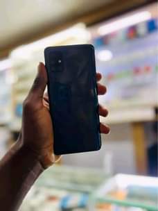 A picture of Samsung a51 still new call or Whatsapp 0701309724 we do