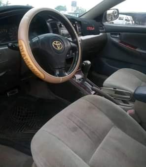 A picture of Distress Super Clean Toyota Corolla Good Engine and gear AC