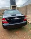 A picture of Toyota camry black ibadan 4plug