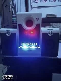 A picture of Original white nd black Lasonic woofer on sale no Bluetooth