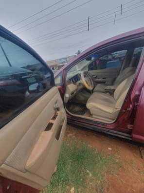 A picture of Clean Nigerian Used Nissan Tiida Repainted Fabric interior Sound four