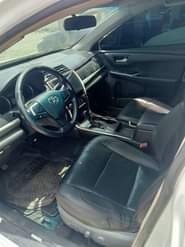 A picture of 2016 Toyota Camry with reverse camera screen Untampered engine and