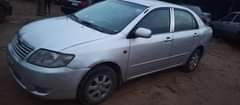 A picture of 03 04 corolla everything is working well Going for 1