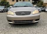 A picture of TOYOTA COROLLA 09035015509 COLOUR Gold PRICE 1 2m naira Hidden