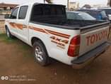 A picture of Toyota Hilux low jack 2008 model Sound untampered engine and