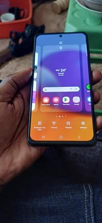 A picture of Samsung galaxy a72 32inches smart tv