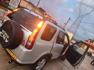 A picture of Sharp Honda CRV for sale buy and drive. location Awka