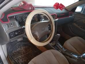A picture of Toyota Camry Tiny light Engine gear Perfect Ac ok just