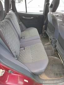 A picture of Toyota Rav4 first body pan with untampered engine and Gear