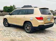 A picture of NEATLY USED 2010 TOYOTA HIGHLANDER LIMITED EDITION upgraded to 2013