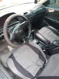A picture of Toyota Corolla going for 950 Only ac not working Location