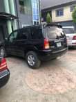 A picture of Mazda Tribute Everything perfect AC needs gas Going for 900k