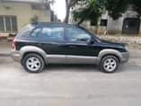 A picture of 2007 Hyundai Tucson Engine gear ac good Some dents on