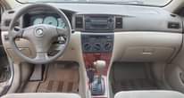 A picture of Clean registered Toyota Corolla LE 2003 model is available for