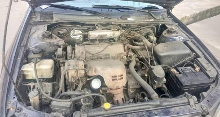 A picture of TINYLIGHT CAMRY 4 Plugs Good Engine and Gearbox AC WORKING