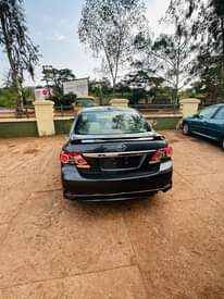 A picture of REGISTERED MAKE TOYOTA MODEL COROLLA YEAR 2010 CONDITION BUY AND