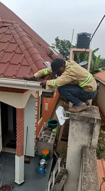 A picture of CCTV satellite and electric fence installations