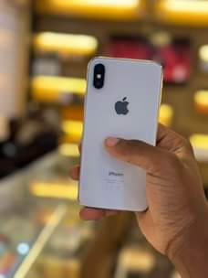 A picture of iPhone X 64gb Faceid working 730k only 0759979422 0773648989