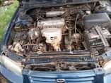 A picture of Toyota Camry tiny light very clean interior sharp body engine