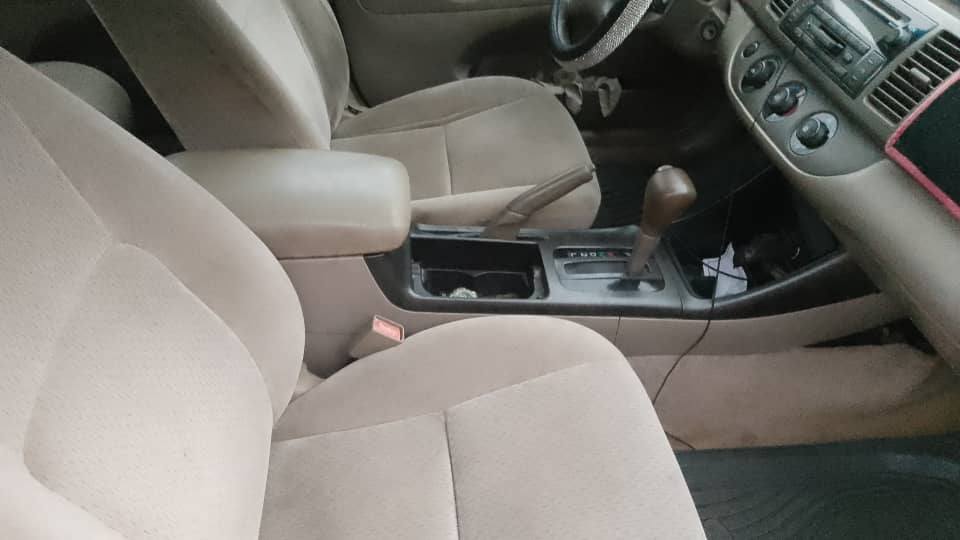 A picture of Toyota Camry 04 engine and gear OK ac needs attention
