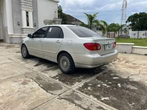 A picture of LIGHTLY USED TOYOTA COROLLA LE 2003 MODEL WITH DUTY LOCATION