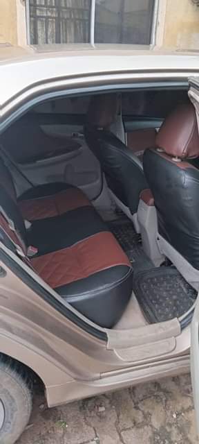 A picture of Fairly used Toyota corolla 2011 2012 Model Painted on first