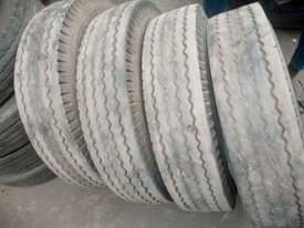 A picture of At all size of your truck Tyres both old and