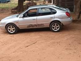A picture of Well used clean Toyota Corolla with manual gear engine and
