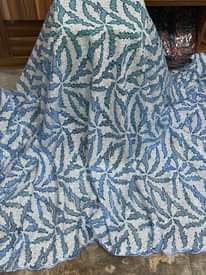 A picture of WEDDING GOWN MATERIAL FOR EXPENSIVE BRIDES AT AFFORDABLE PRICE Message