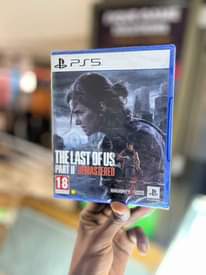 A picture of PS5 and PS4 Game CDs