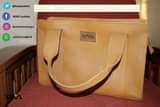 A picture of KAIA Leather Its all in the bag with a back