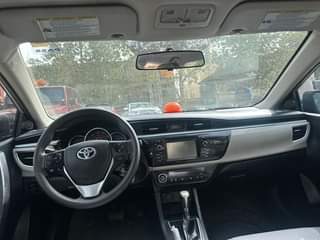 A picture of Extremely clean 2014 15 Corolla 8 1million