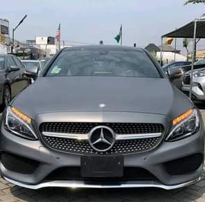 A picture of REGISTERED 2016 MERCEDES BENZ C300 COUPE Grey on Brown Interior