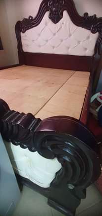 A picture of Bed matress and dressing mirror