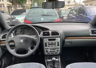 A picture of Toks P406 Model 2004 Engine EW10 Trans Manual Price 1