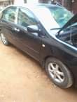 A picture of NIGERIA USED TOYOTA COROLLA WITH Good enginegood auto gearneat interiorAC