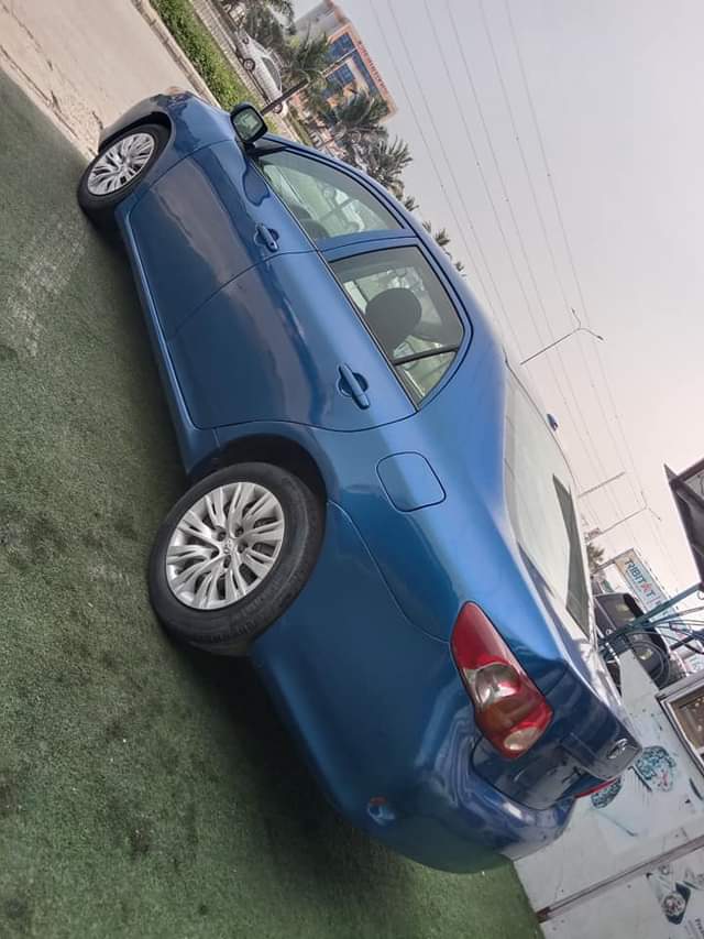 A picture of 2010 registered Toyota corolla Very clear fish on first body