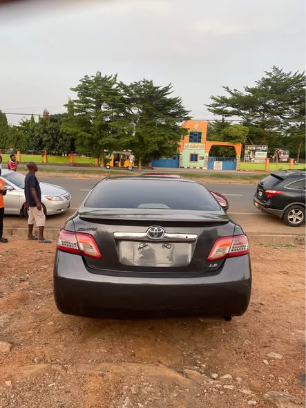 A picture of Super sharp 08 Toyota Camry with upgraded lights to 2010