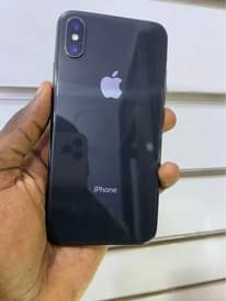A picture of iPhone X 256gb faceid working 730k WhatsApp or call 0759979422