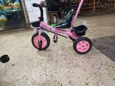 A picture of Kids rechargable cars tricycles bikes and other kids items.0703467747