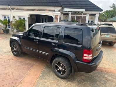 A picture of CLEAN BARELY USED 2009 JEEP LIBERTY FIRST BODY PAN FIRST