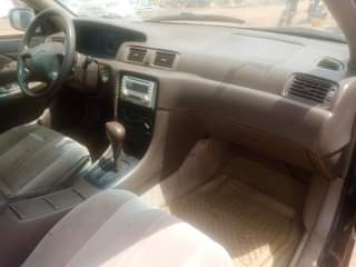 A picture of Toks standard. Toyota Camry bought by first user barely driving.