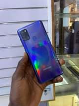 A picture of Samsung A21s 64gb 4gb ram clean no cracks at 350000