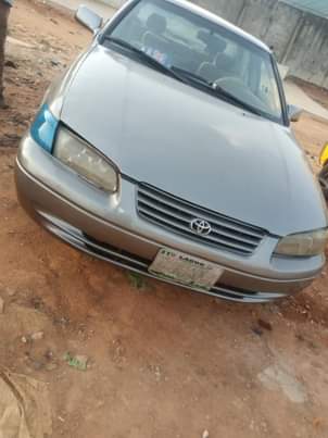 A picture of Toyota Camry 4plugs Perfectly working buy and drive with small