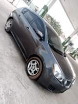 A picture of Pontiac Vibe 2009 010 model 4 plugs Uber Bolt Standard