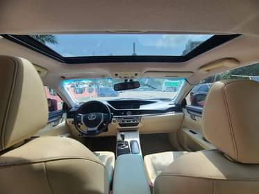 A picture of Newly Arrived Tokunbo 2014 Lexus ES350 Fullest option Cream leather
