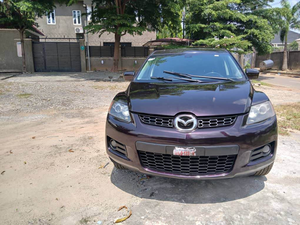A picture of Distress Very sharp and clean Mazda CX9 clean in and