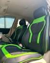A picture of Tonny Car interiors we do upgrade seat covers floor roof